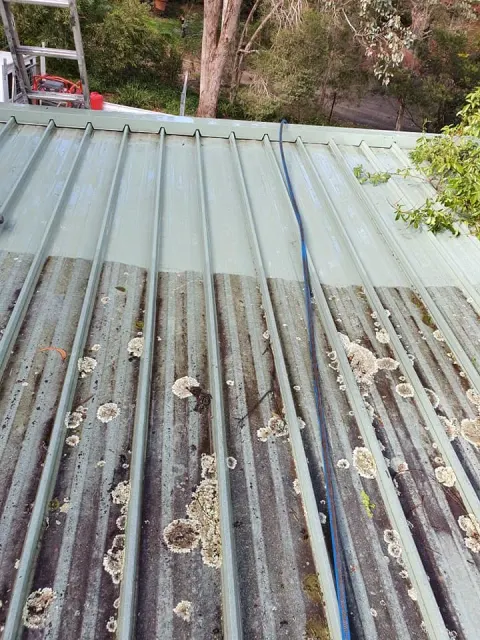 Damaged roof before repair