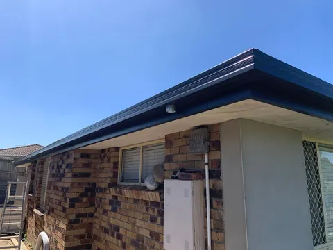New gutters and fascia covers along a Melbourne roofline