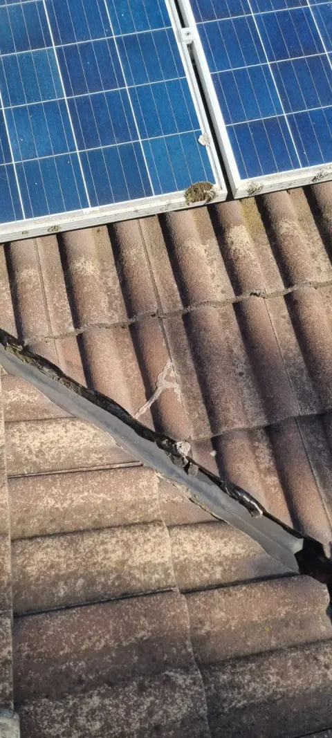Cracked ridge bedding repaired near solar panels in Melbourne