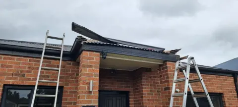 Storm-damaged eave and fascia on a Melbourne home before roof plumbing repairs
