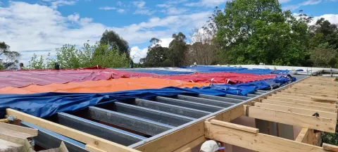 Melbourne roof stripped to the battens and tarped during a full replacement