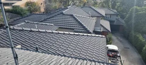 Large tiled roof restored in grey in Melbourne