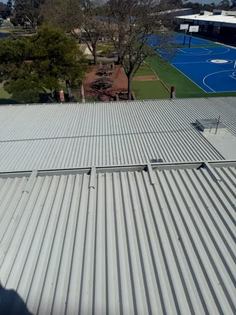 Cleaned commercial metal roof sheeting on a Melbourne commercial building
